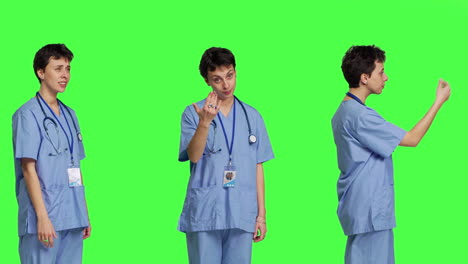 Medical-assistant-asking-a-person-to-come-over-closer-against-greenscreen